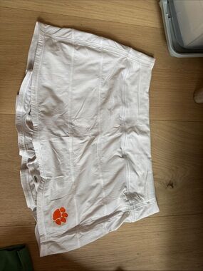 White Women’s Athletic Skort with Orange Paw Accent- Clemson
